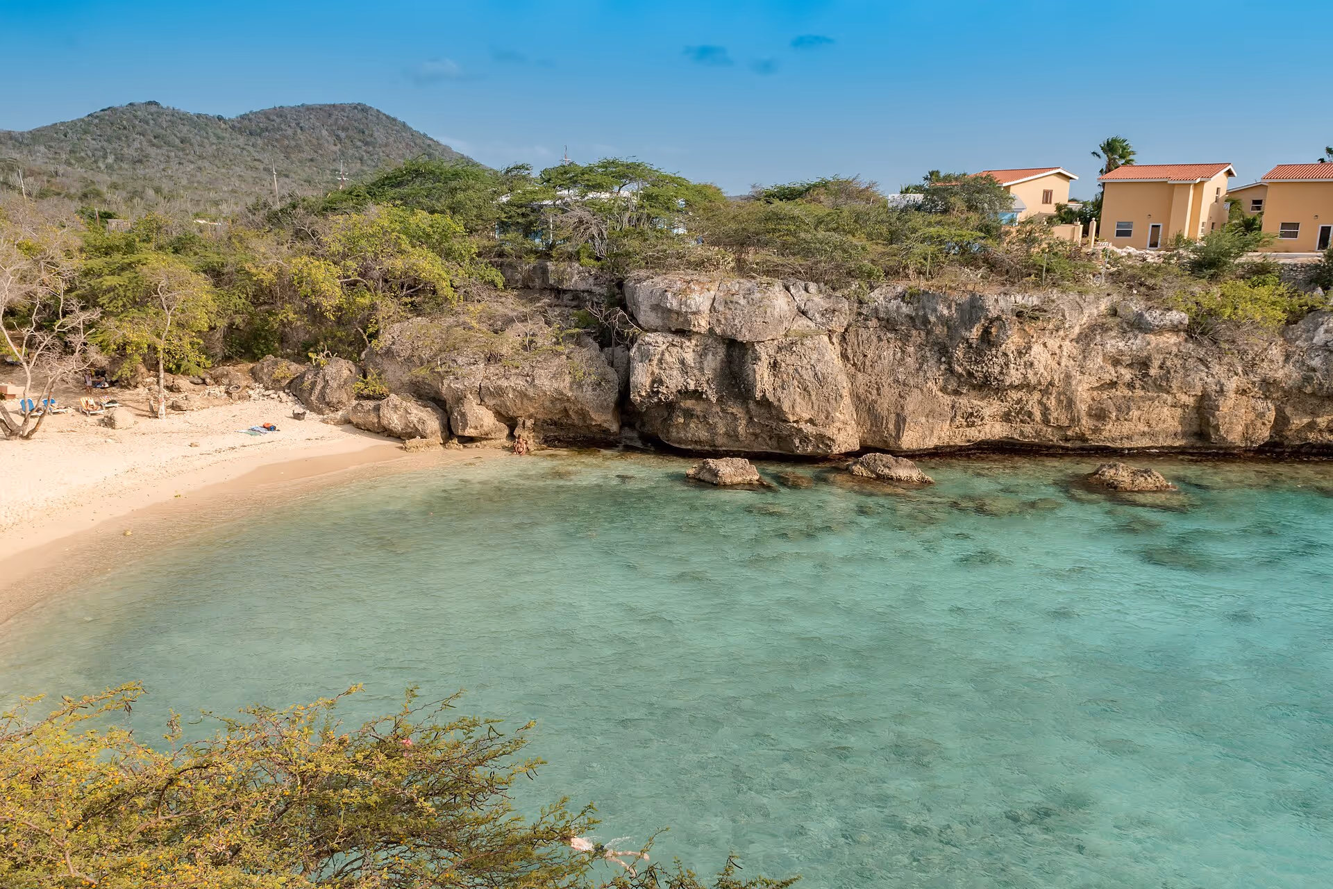 The narrow cliff-walled cove of Playa Lagun with its small sand beach